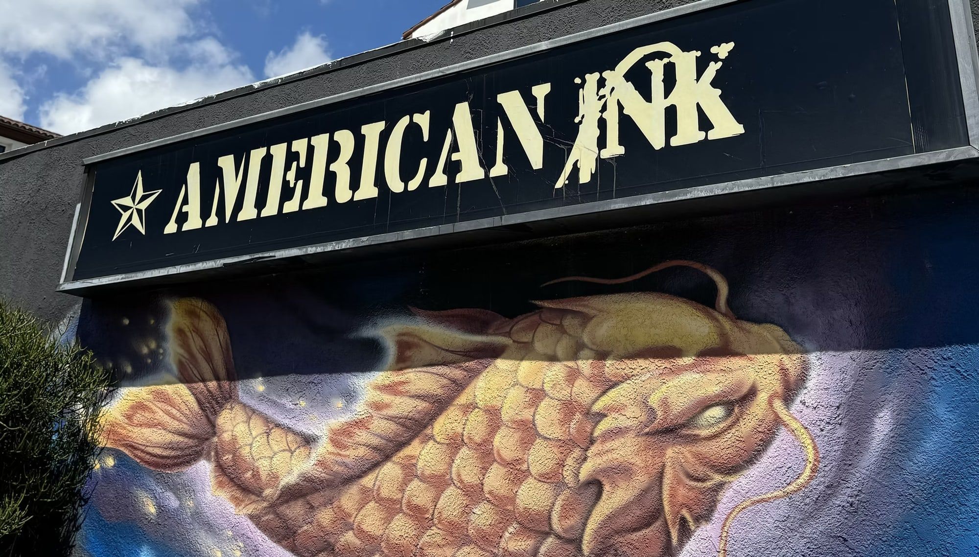 American Ink storefront mural with koi artwork in Sherman Oaks